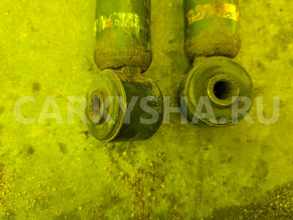 Амортизатор Mitsubishi Grandis оригинальный номер MR594436