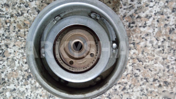 Натяжитель ремня Фольксваген гольф 6 Volkswagen Passat оригинальный номер 06A903315