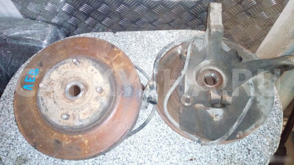 Кулак поворотный левый Митцубиси Лансер 9 Mitsubishi i оригинальный номер MR491322