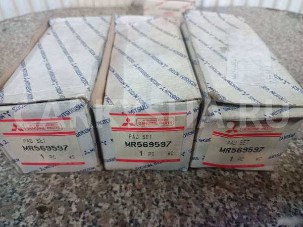 Колодки тормозные дисковые передние Митцубиси Л200 Mitsubishi i оригинальный номер MR569597