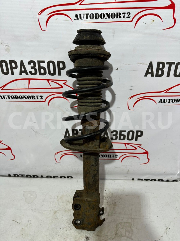 Амортизатор передний левый Toyota Yaris 2005-2012 Toyota Yaris оригинальный номер 4852059365