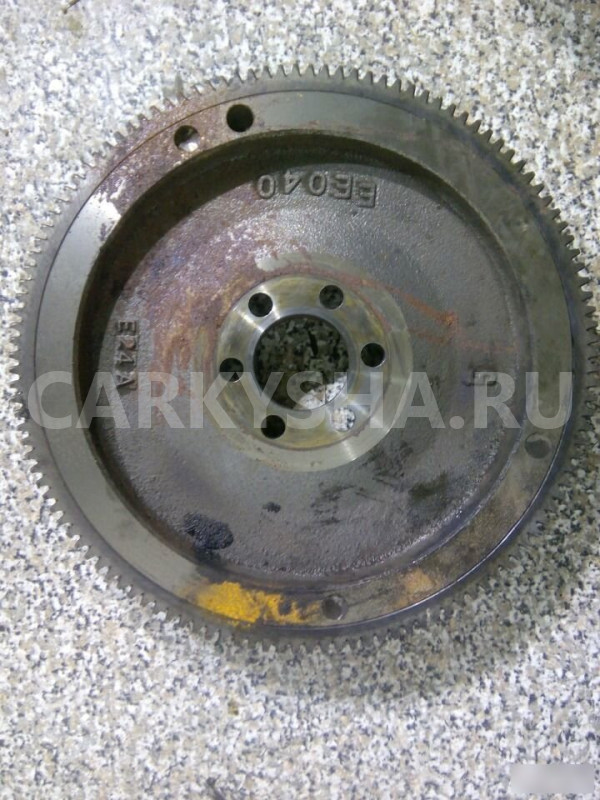 Маховик двигателя Ниссан Тиида Nissan Tiida 1.6 Nissan Tiida оригинальный номер 12310EE000