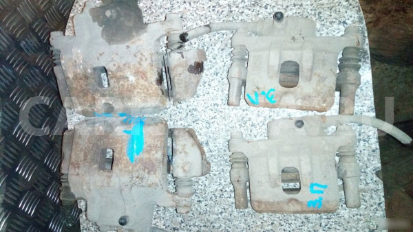 Суппорт левый правый Mitsubishi Lancer 9 Mitsubishi i оригинальный номер 4605A477